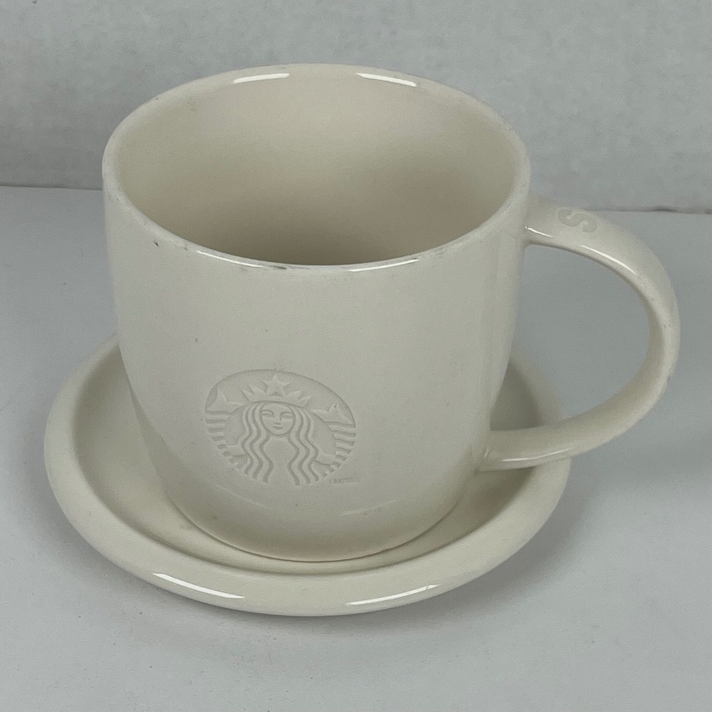 Starbucks 2010 Embossed Siren Logo Coffee Mug and Saucer Set Off White Cream S